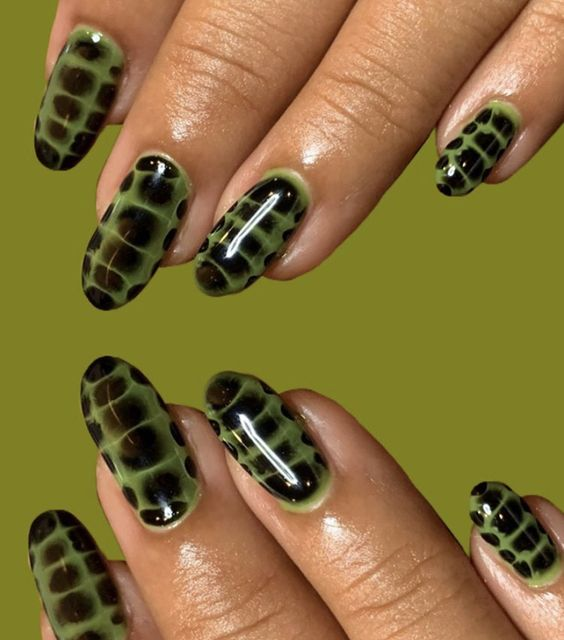 Black Prints on Green Crocodile Nails