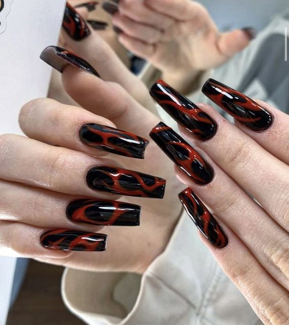 Geometric Patterns on Red Nails