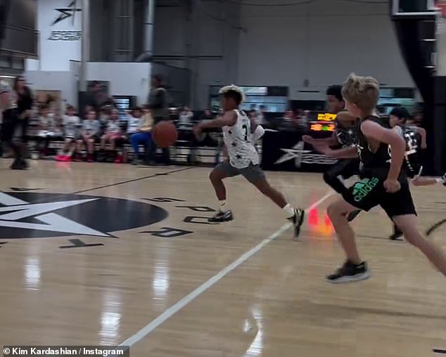 Saint was filmed running across the court while dribbling the ball as he made his way to the other side to attempt to score a point