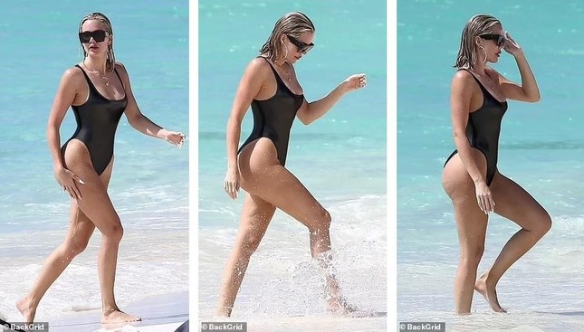 Khloe Kardashian bốc lửa với áo tắm cắt khoét giữa tin có con thứ 2 với tình cũ phản bội - Ảnh 1.