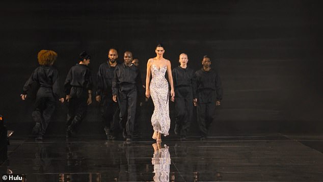 They show Kendall walking, with a cadre of backup dancers in tow, as Kris enthuses in confession, 'It's magical. I mean, Kendall comes out on the runway, and she has dancers. Kendall has backup dancers. It was so fun'